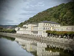 A casino building in Neoclassical style at a river