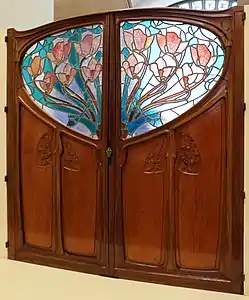 Doors with stained glass for the Store of Francois Vaexlaire in Nancy (1901), glass by Jacques Grüber, doors by Émile Andrè and Eugéne Vallin