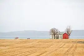 A farm in the characteristic flat landscape of Ørland