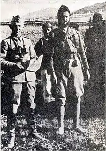 Black and white photograph of several men in uniform