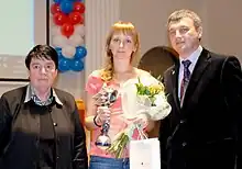 Hand-over of the Caissa Chess Award to Nadezhda Kosintseva by Nona Gaprindashvili and Igor Lobortas