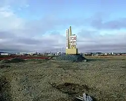 Monument at the entrance to the abandoned settlement of Polyarny