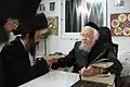 Rabbi Yehoshua Leifer [he], owner of Oz Vehadar, meeting with Rabbi Yosef Shalom Eliashiv