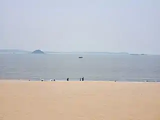 View of Binlang Islet from Xiamen's One country, two systems beach (center left)