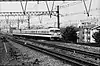 A JNR 117 class train on the Tōkaidō Main Line departing Tsukamoto Station in 1978