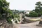 Sloped streets with masonry walls.