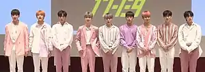 1the9 in April 2019From left to right: Yechan, Sungwon, Junseo, Doyum, Taewoo, Taekhyeon, Jinsung, Seunghwan, and Yongha.