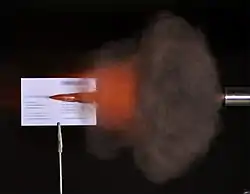 Ultra-high speed photo of a 150 grain FMJ .308 Winchester bullet photographed with an air-gap flash