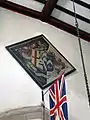 Funerary hatchment above the tower arch