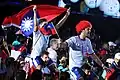 Argentinian athletes in the closing ceremony, with flags of the Republic of China.