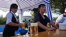 Street food vendors selling draft beer at the 10th Pyongyang Autumn International Trade Fair