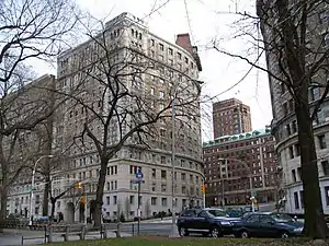 Curved facades of The Colosseum and The Paterno at 116th Street