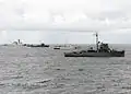 BRP Iloilo (PS-32), BRP Pampanga (SARV-003), BRP Miguel Malvar (PS-19), BRP Salvador Abcede (PG-114) and USCGC Waesche (WMSL-751) join USS Vandegrift (FFG-48) for a photo exercise (PHOTOEX) during CARAT 2012-Philippines