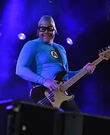 Larson performing with The Aquabats in 2013.