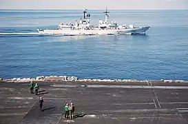 USS Nimitz and Francesco Mimbelli alongside each other in the Mediterranean Sea on 26 October 2013.