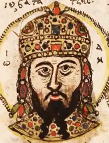 Head of a bearded man wearing a crown.