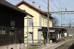 Two-story building with gabled roof