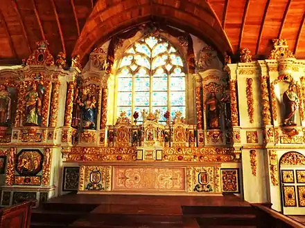 The sumptuous altarpiece of the main altar in the  Sainte-Marie du Ménez-Hom  chapel