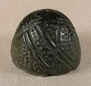 Cast 14th century thimble.