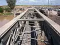 A view of the sway brace system of a Medium Girder Bridge before the decking is placed. Kazer River, Mosul, Iraq, 2003.