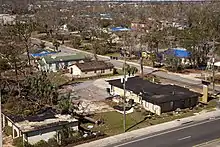 Elevated view of damaged buildings and trees in Panama City