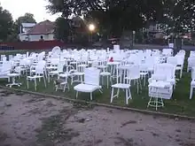 Installation of 185 empty chairs