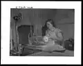 Woman with radio (far right), Knox County, Tennessee, 1942