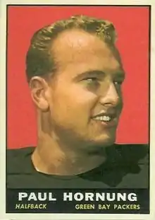 A color photo of a smiling Paul Hornung, with the text "Paul Hornung, Halfback, Green Bay Packers" in a black bar below the photo