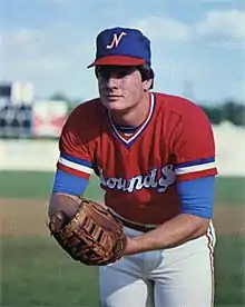 A baseball player in red and white