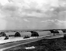 Five semi-cylinder shaped huts