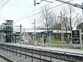 Station with Du Meelaan behind. Bus stop is also visible