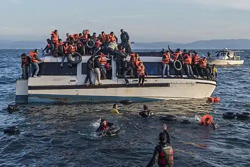 Image 46Syrian and Iraqi refugees arriving in Greece. In the 2010s Europe had been severely affected by a huge migration from Africa and Middle East (from 2010s)