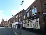 Castle Tavern and adjacent 1930s shops