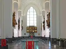 View of the prayer room (chapel choir) with historical figures and objects restored