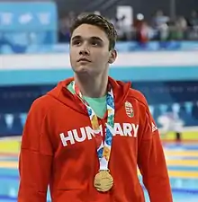 Kristóf Milák with the gold medal