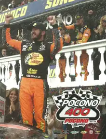 The 2019 Pocono 400 program cover, featuring Martin Truex Jr.