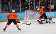 Team Orange scores a goal against Team Blue