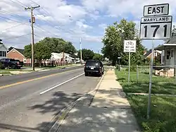 View east along Maryland State Route 171 (Church Street) at Maryland State Route 2 (Governor Ritchie Highway) in Brooklyn Park.