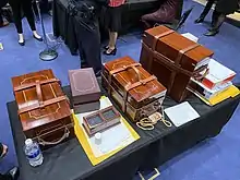 A table with brown boxes.