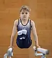 Gymnasts from the canton of Zurich in the introductory program on parallel bars