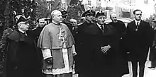 Image 7Enthronement as Co-Prince in 1942 of Bishop Ramón Iglesias (centre). The local comite was led by Francesc Cairat (left), the First General Syndic with the longest regencie, from 1936 to 1960. (from Andorra)