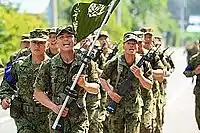 Physical training: 10-mile run with the Ranger flag in the lead