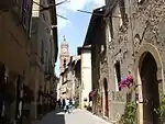 Narrow street and three-storied houses.