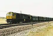 319.4 in standard yellow/grey 'Taxi' freight livery