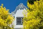 The U-shaped Cape-Dutch house on this property was erected in about 1800 and has a concavo-convex gable in front. The erven form an important part of the street scene of the historic Church Street in Tulbagh. Type of site: House. Previous use: Residential. Current use: Residential.