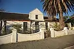 National Monument (see 163 Tulbagh Street). The original portion of this Cape Dutch building complex with its typical holbol gable was erected in 1820/21 and is reputed to be the oldest existing dwelling in Worcester. The front portion of the complex with its typical Worcester gables dates from the Type of site: House Current use: House.