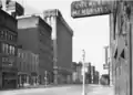 Looking west along the Boulevard of The Allies on November 14, 1937. The Salvation Army Evangeline Residence sign is visible on the right.