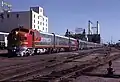 ATSF San Diegan EMD F7 (1968), displaying the "SANTA FE" in black Railroad Roman letters along each side