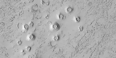 Close view of cones, as seen by HiRISE under HiWish program.  These cones probably formed when hot lava flowed over ice-rich ground.