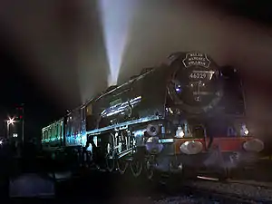 As No. 46229, Duchess of Hamilton lifts her boiler safety valves at Crewe Bank, Shrewsbury after hauling the Welsh Marches Pullman charter on 31 October 1982